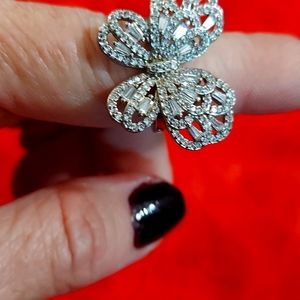 Silver tone ring with white stones